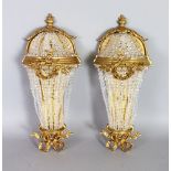 A PAIR OF ORMOLU AND CUT GLASS WALL APPLIQUES, of chandelier form. 1ft 7ins high.