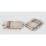 TWO SMALL SILVER MOUNTED NOTEBOOKS.