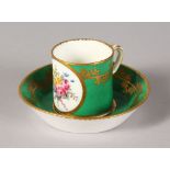 AN 18TH CENTURY SEVRES SMALL CYLINDRICAL CUP AND saucer (gobelet 'litron' et soucoupe fond vert),