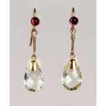 A PAIR OF 9CT GOLD GARNET SET DROP EARRINGS.