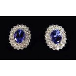 A VERY GOOD PAIR OF 18CT WHITE GOLD, TANZANITE AND DIAMOND CLUSTER EARRINGS of over 4CTS.