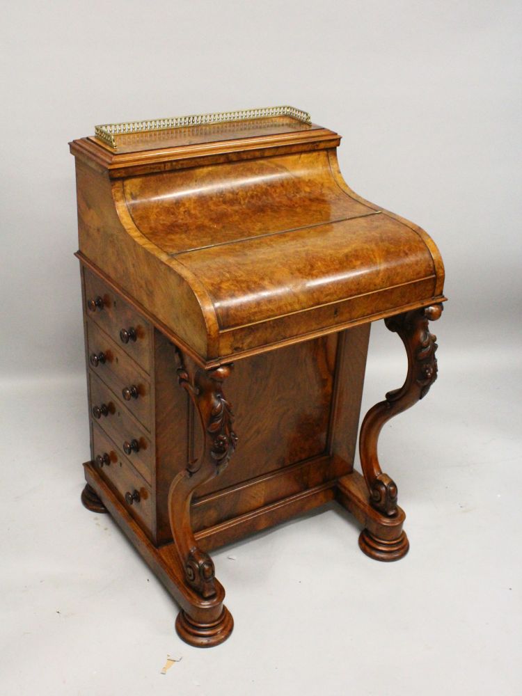 A GOOD VICTORIAN WALNUT PIANO TOP DAVENPORT, with brass grill, rising and sliding fitted top, four - Image 2 of 2