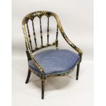 A VICTORIAN BLACK LACQUER AND PAINTED SPINDLE BACK ARMCHAIR, with overstuffed seat.