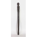 AN AFRICAN FIGURAL CARVED WOOD STAFF. 1ft 7ins long.