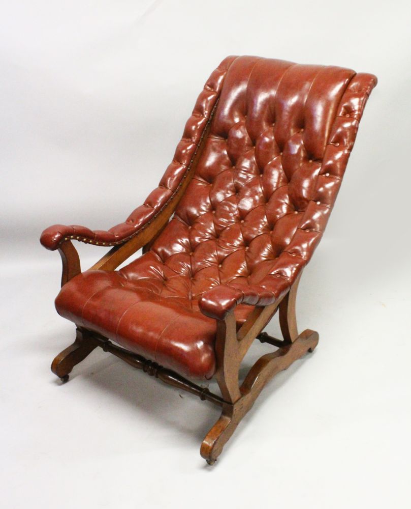 A GOOD BUTTON UPHOLSTERED AND MAHOGANY FRAMED ARMCHAIR.