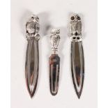 THREE SILVER OWL BOOK MARKS.