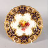 A ROYAL WORCESTER FINE PLATE with cobalt blue border and art nouveau style gilding, the centre