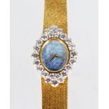 A LADIES 18CT YELLOW GOLD DIAMOND SET COCKTAIL WATCH by DE LAVEAU, SWISS, with lapis face and set