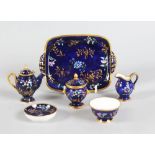 A SPODE MINIATURE CABARET SET, CIRCA. 1820, rich blue ground, tray, coffee pot, sugar bowl, jug