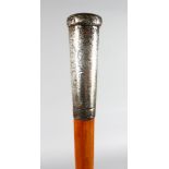 A WALKING STICK with carved ENGRAVED SILVER HANDLE.