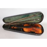 A VIOLIN IN A WOODEN CASE with two bows.