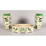 A FRENCH PORCELAIN GARNITURE, B. & CO., FRANCE, comprising pair of vases and jardiniere, decorated