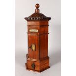 A GOOD GEORGIAN DESIGN HEXAGONAL MAHOGANY POST BOX, with beaded top, carved with acanthus, the front
