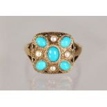 A 9CT GOLD, TURQUOISE AND PEARL RING.