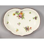 A GOOD WORCESTER CRESCENT SHAPED DISH, painted with flowers. 11ins wide.