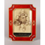 A SUPERB RUSSIAN FABERGE STYLE SILVER AND ENAMEL PHOTOGRAPH FRAME, set with cabochon sapphires and