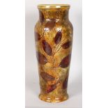 A ROYAL DOULTON LAMBETH STONEWARE NATURAL LEAF VASE. 11.75ins high.