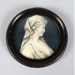 A CIRCULAR PORTRAIT, A CLASSICAL LADY. 2.5ins diameter, in a wooden frame.