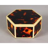 A FAUX TORTOISESHELL AND IVORY BANDED HEXAGONAL BOX AND COVER. 7.5cms.