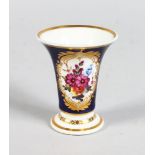 A MINIATURE CHAMBERLAIN'S WORCESTER VASE, CIRCA. 1800, blue ground edged in gilt and painted with