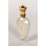 A CUT GLASS SCENT BOTTLE with 9ct gold top. 3.75ins.