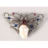 A GOOD GOLD AND SILVER BUTTERFLY BROOCH set with mother-of-pearl, sapphire and diamonds.
