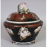 AN UNUSUAL 20TH CENTURY JAPANESE MOULDED PORCELAIN TRIPOD BOWL & COVER, the decoration reserved on a