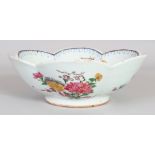 AN 18TH CENTURY STYLE FAMILLE ROSE LOBED HEXAGONAL PORCELAIN BOWL, 8.1in wide & 2.8in high.