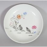 A RARE CHINESE YONGZHENG PERIOD FAMILLE ROSE PORCELAIN SAUCER, the interior painted with a pair of