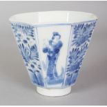 A 19TH CENTURY JAPANESE ARITA PORCELAIN BEAKER CUP, of flaring octagonal form, the sides painted