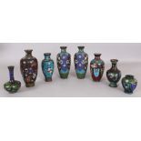 A GROUP OF EIGHT VARIOUS JAPANESE MEIJI PERIOD CLOISONNE VASES, the tallest 7.4in high. (8)