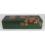AN EARLY 20TH CENTURY JAPANESE GREEN GROUND RECTANGULAR LACQUER BOX, with a hinged cover, 11.3in x