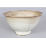 AN 18TH/19TH CENTURY KOREAN PORCELAIN BOWL, applied with a pale celadon glaze turning brown at the