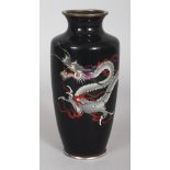 A GOOD QUALITY JAPANESE MEIJI PERIOD BLACK GROUND CLOISONNE DRAGON VASE, together with a fitted wood