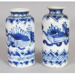 A GOOD SMALL PAIR OF CHINESE KANGXI PERIOD BLUE & WHITE PORCELAIN VASES, each painted with objects