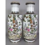 A LARGE PAIR OF GOOD QUALITY CHINESE REPUBLIC STYLE PORCELAIN ROULEAU VASES, each decorated with a