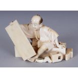 A GOOD QUALITY SIGNED JAPANESE MEIJI PERIOD IVORY OKIMONO OF SEATED CARPENTER, holding between his