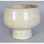 ANOTHER 18TH/19TH CENTURY KOREAN PORCELAIN BOWL, the ovoid body applied with a pale celadon glaze