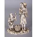 A GOOD SIGNED JAPANESE MEIJI PERIOD IVORY OKIMONO OF WOMAN & TWO CHILDREN, the infant carried on her