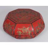 A 20TH CENTURY CHINESE MING STYLE OCTAGONAL LACQUER BOX & COVER, 5.25in wide & 2.4in high.