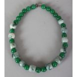 A CHINESE JADE & HARDSTONE NECKLACE, composed of shaped jade beads and of spherical hardstone beads,