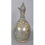 A PERSIAN SAFAVID LUSTRE GLAZED POTTERY EWER, 17th Century or later, decorated in slightly moulded