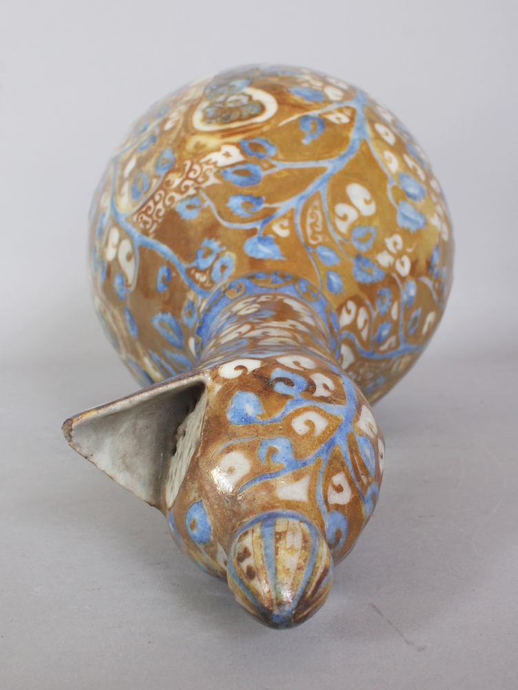 A PERSIAN SAFAVID LUSTRE GLAZED POTTERY EWER, 17th Century or later, decorated in slightly moulded - Bild 6 aus 8