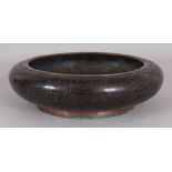 AN EARLY/MID 20TH CENTURY CHINESE BLACK GROUND SHALLOW CLOISONNE DRAGON BOWL, 9.8in diameter.