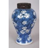 A GOOD CHINESE KANGXI PERIOD BLUE & WHITE PORCELAIN VASE, circa 1700, with a good quality prunus