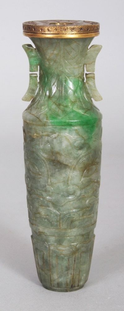 A GOOD QUALITY 19TH/20TH CENTURY JADE VASE, the sides carved with taotie masks between lappet and