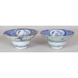 A PAIR OF 19TH CENTURY CHINESE BLUE & WHITE PROVINCIAL PORCELAIN BOWLS, with concave flaring rims,