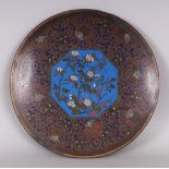 A GOOD QUALITY JAPANESE MEIJI PERIOD CLOISONNE DISH, decorated to its centre with a sky-blue