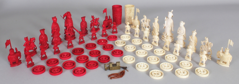 A GOOD 19TH CENTURY CHINESE CANTON IVORY CHESS SET, complete, the white king 3.8in high, the pawns