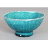 A SMALL ORIENTAL TURQUOISE GLAZED CERAMIC BOWL, 3.9in diameter & 1.8in high.